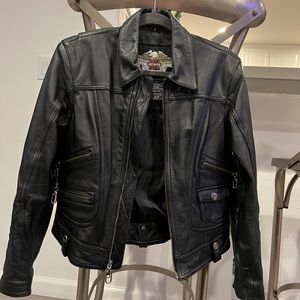 Woman’s size small Authentic Harley Davidson black motor jacket .